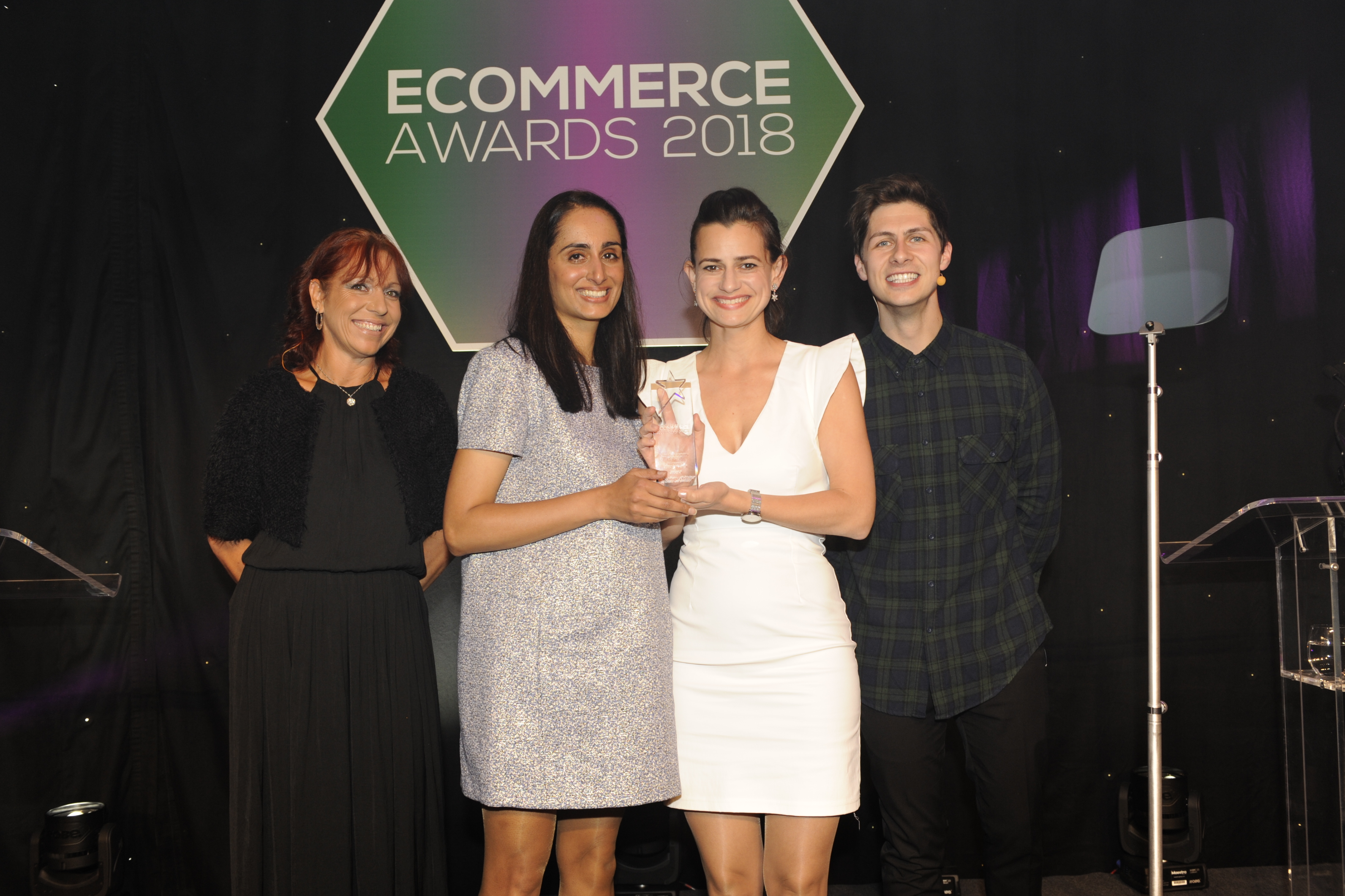 Rohini Contractor, VP of UK at Antavo and Zsuzsa Kecsmar, CMO of Antavo being awarded their eCommerce 2018 trophy by the hosts of the evening.