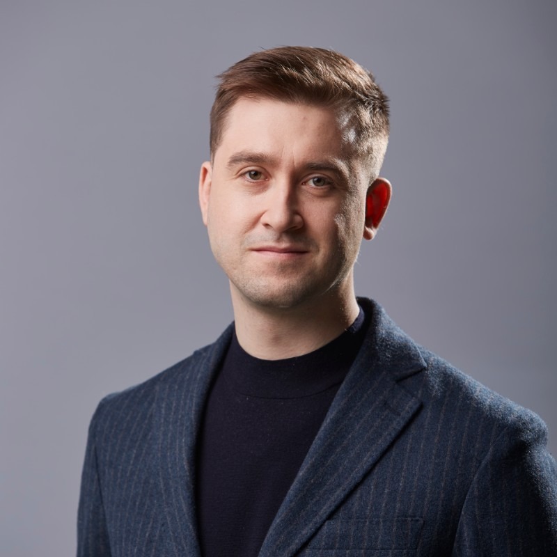 Headshot of Adam Rusiecki
