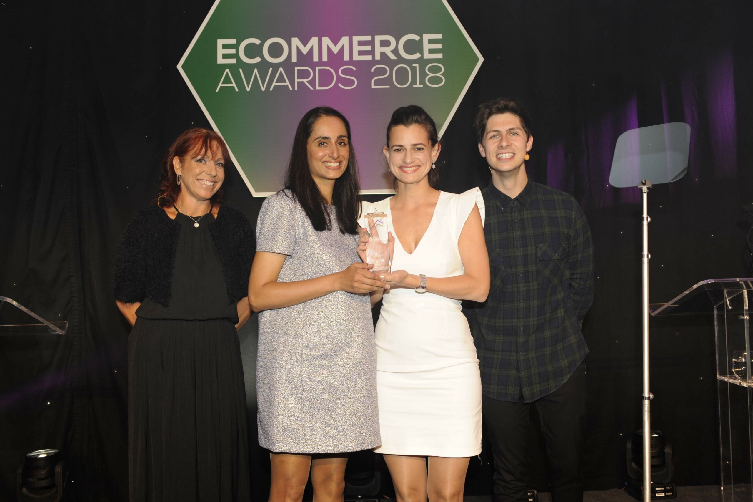 Rohini Contractor, VP of UK at Antavo and Zsuzsa Kecsmar, CMO of Antavo being awarded their eCommerce 2018 trophy by the hosts of the evening.